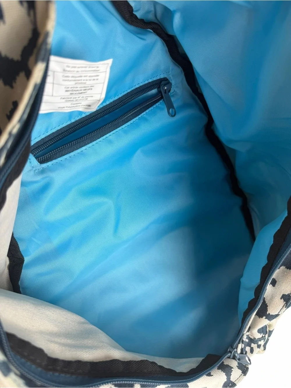 KAVU Rope Sling Bag Ikat Print Canvas Crossbody Backpack